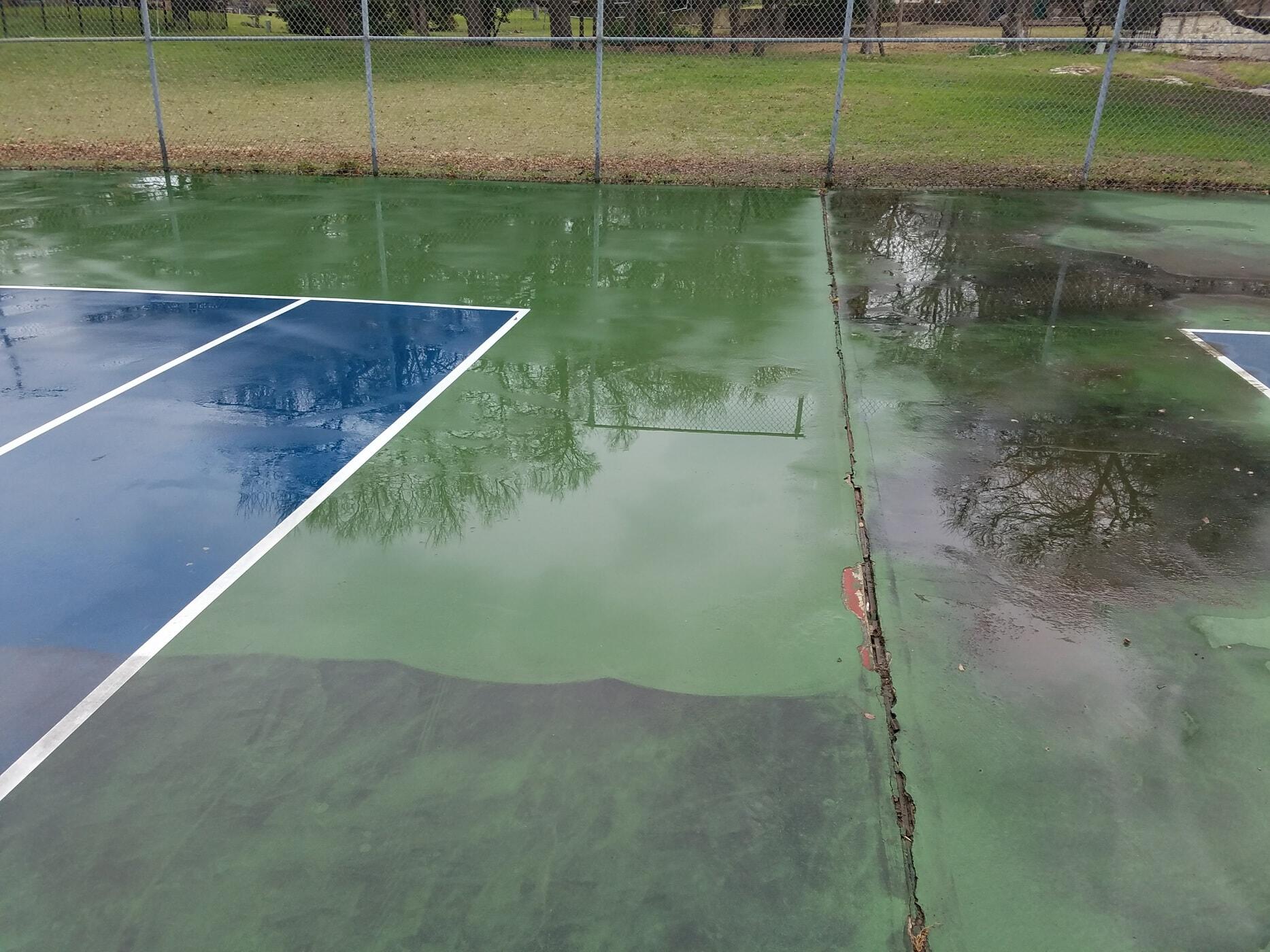Soft washing of tennis court