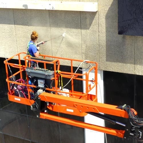 Pressure Washing aggregate building in fort worth, TX