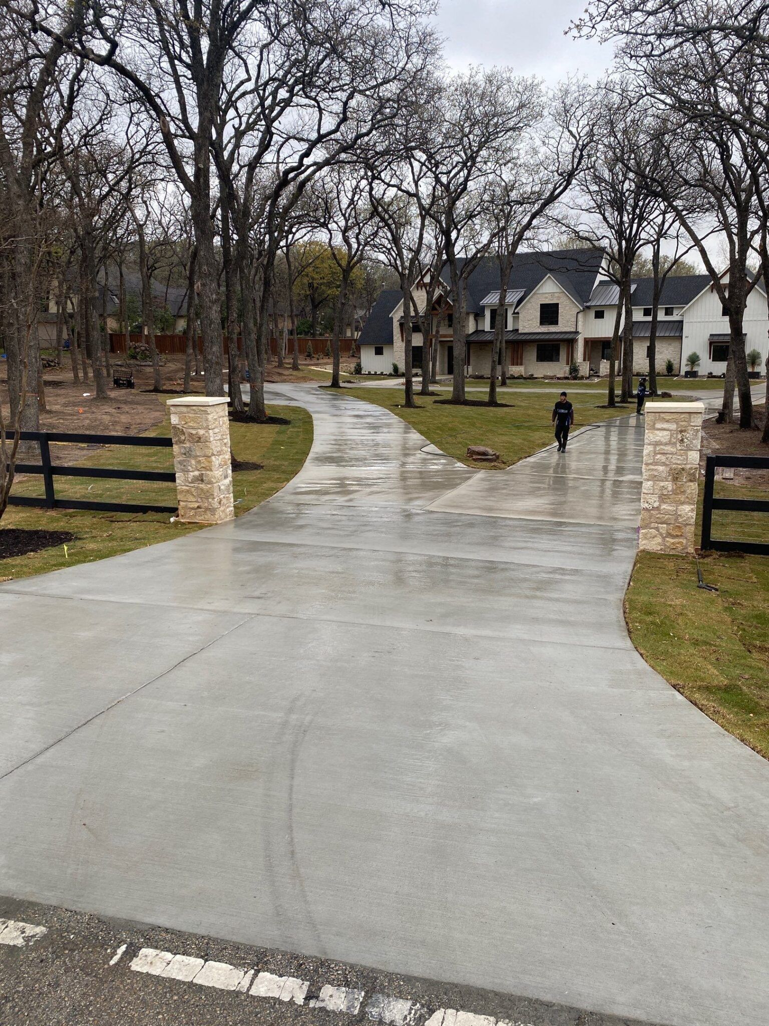 Pressure washing of residential concrete driveway