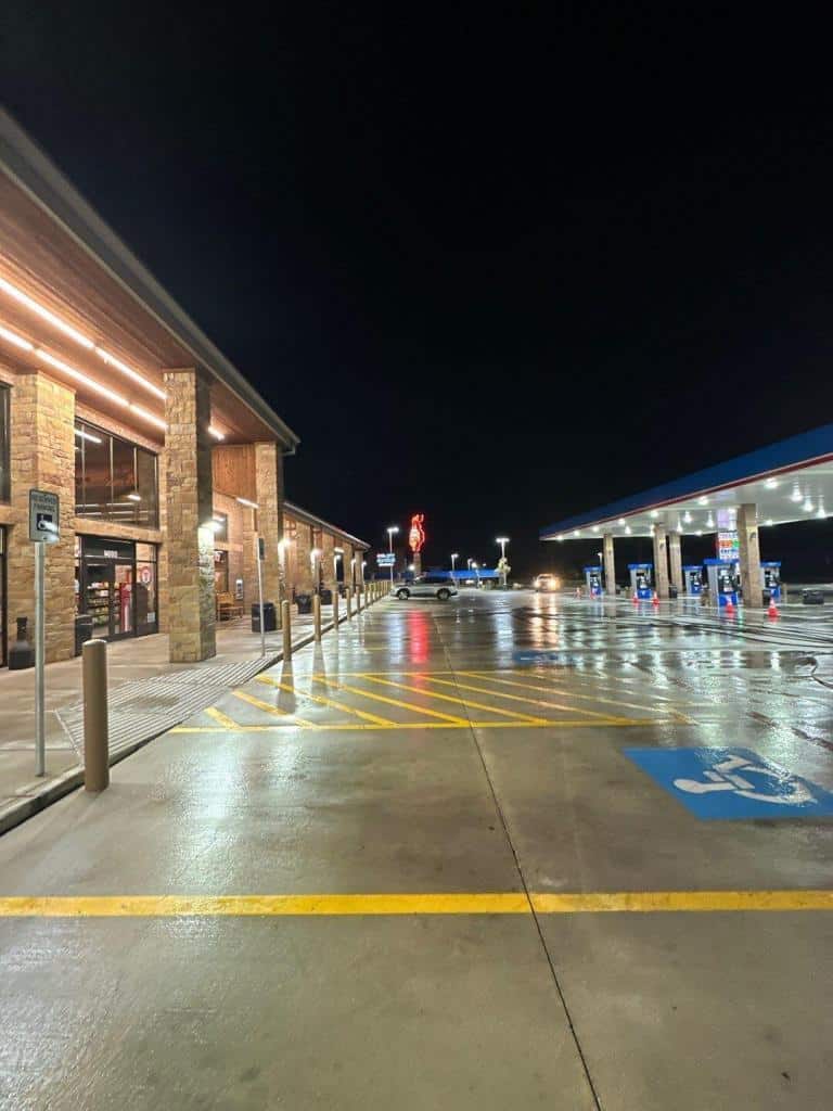 Fresh Pressure Washing of Concrete at Gas Station